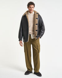 Casaco em pele e lã de bezerro com efeito envelhecido