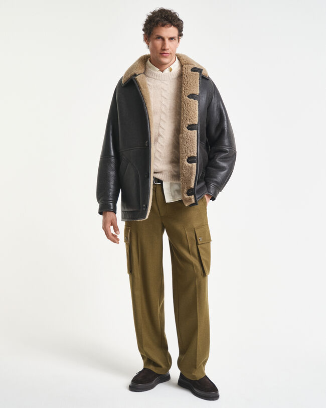 Casaco em pele e lã de bezerro com efeito envelhecido