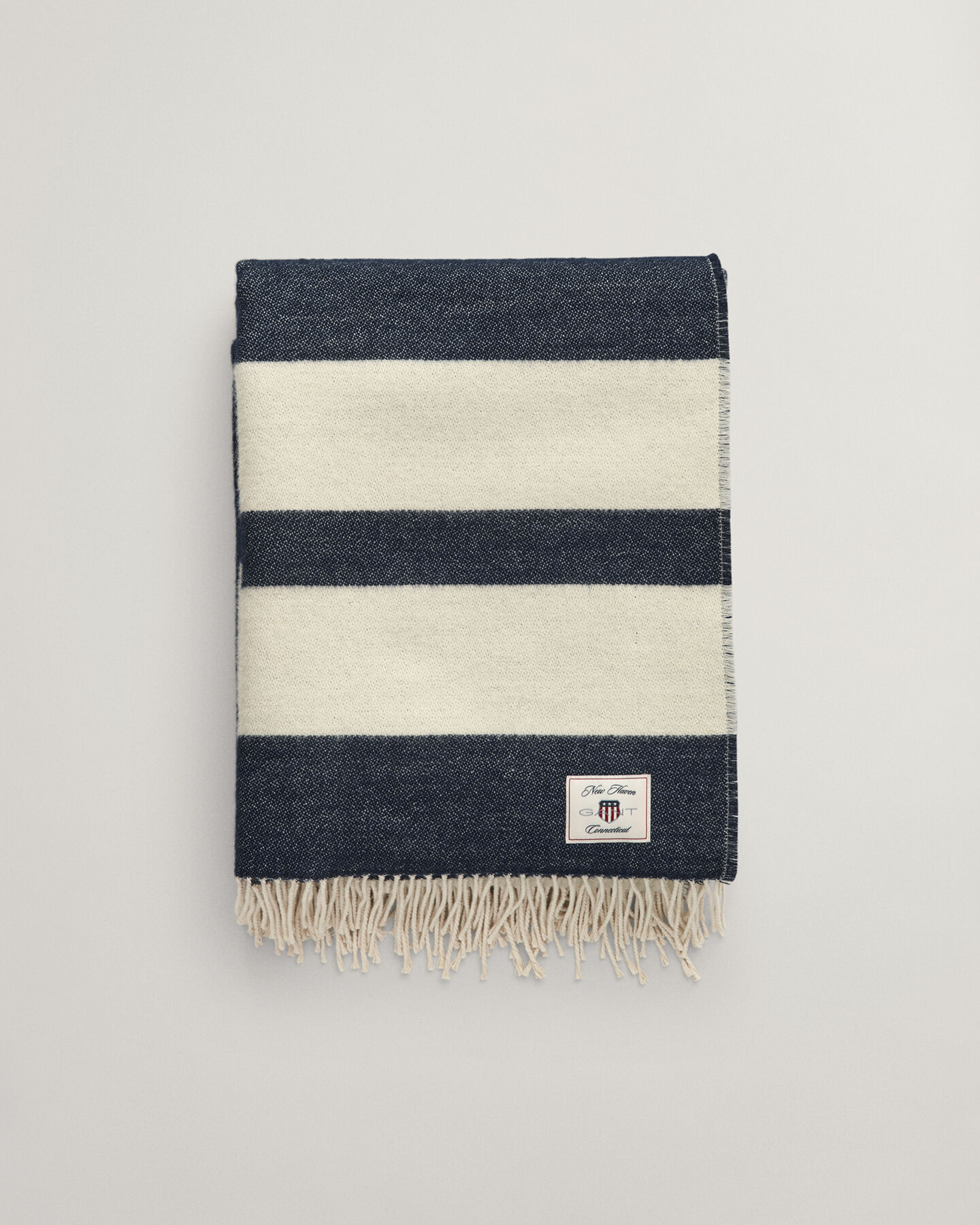 Manta decorativa em lã às riscas