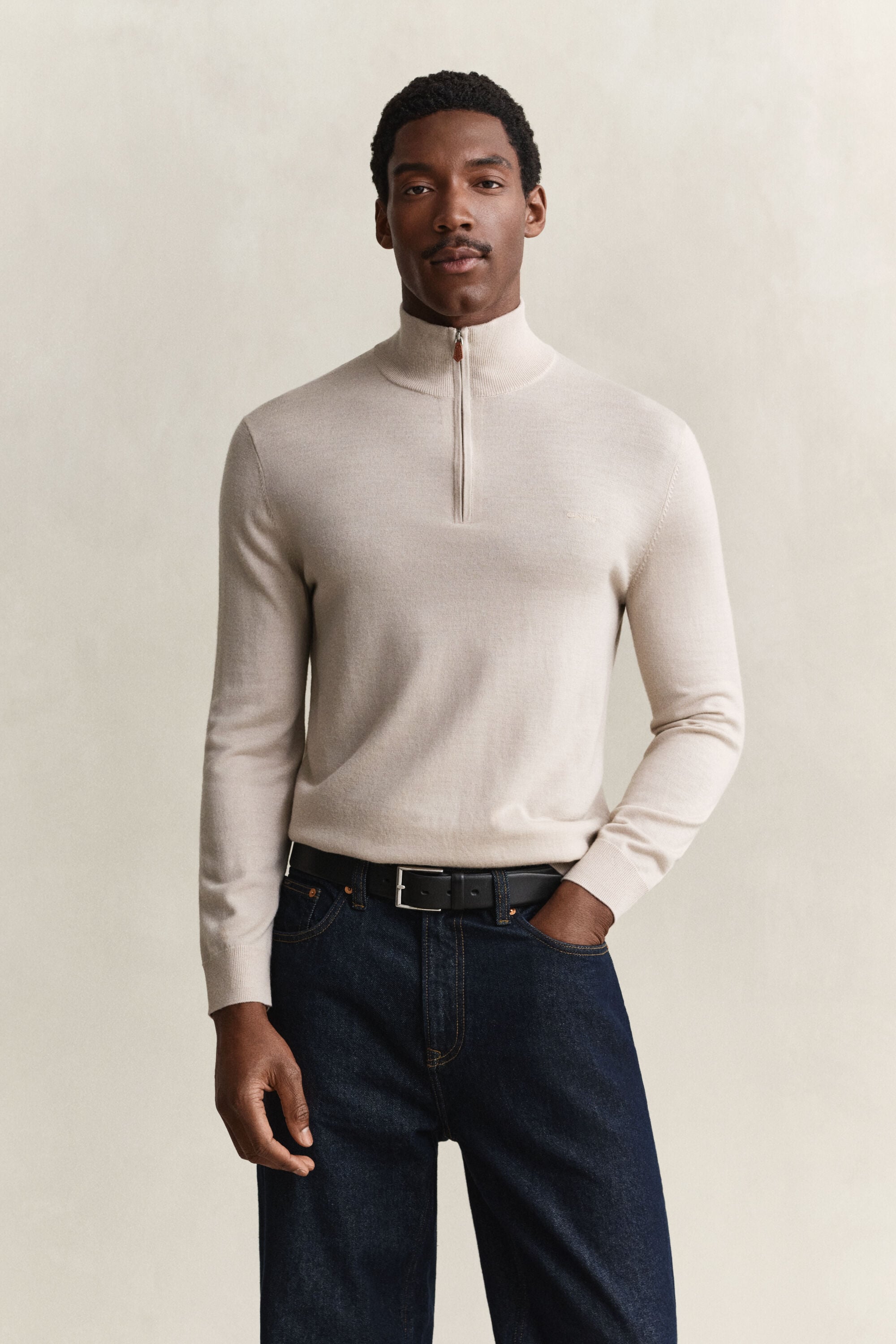 Camisola de malha com meio fecho de correr em lã de merino
