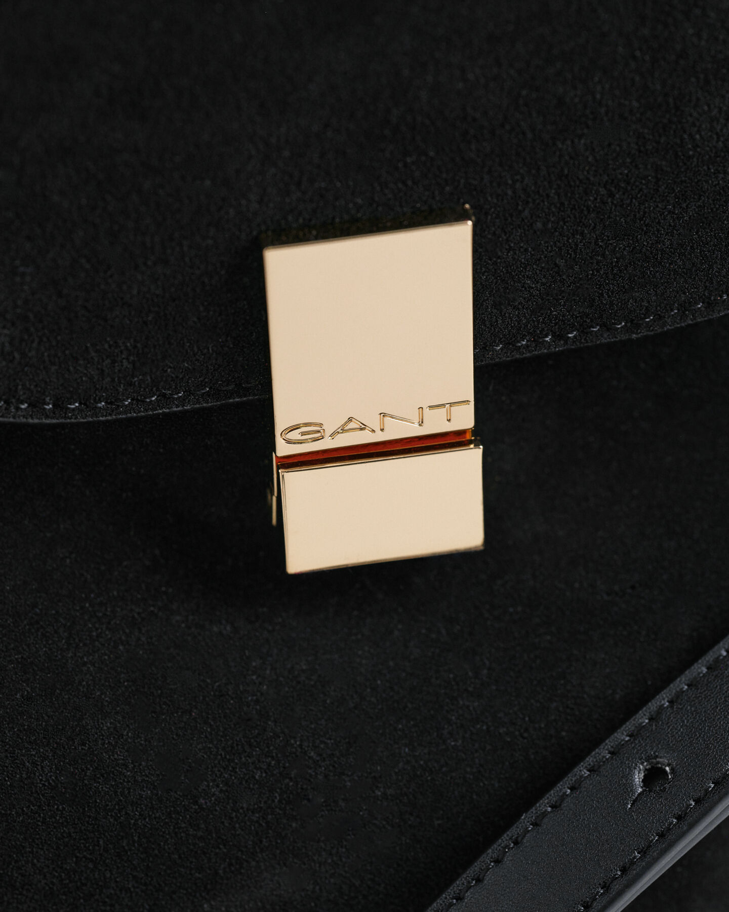 Mala tipo saco em camurça