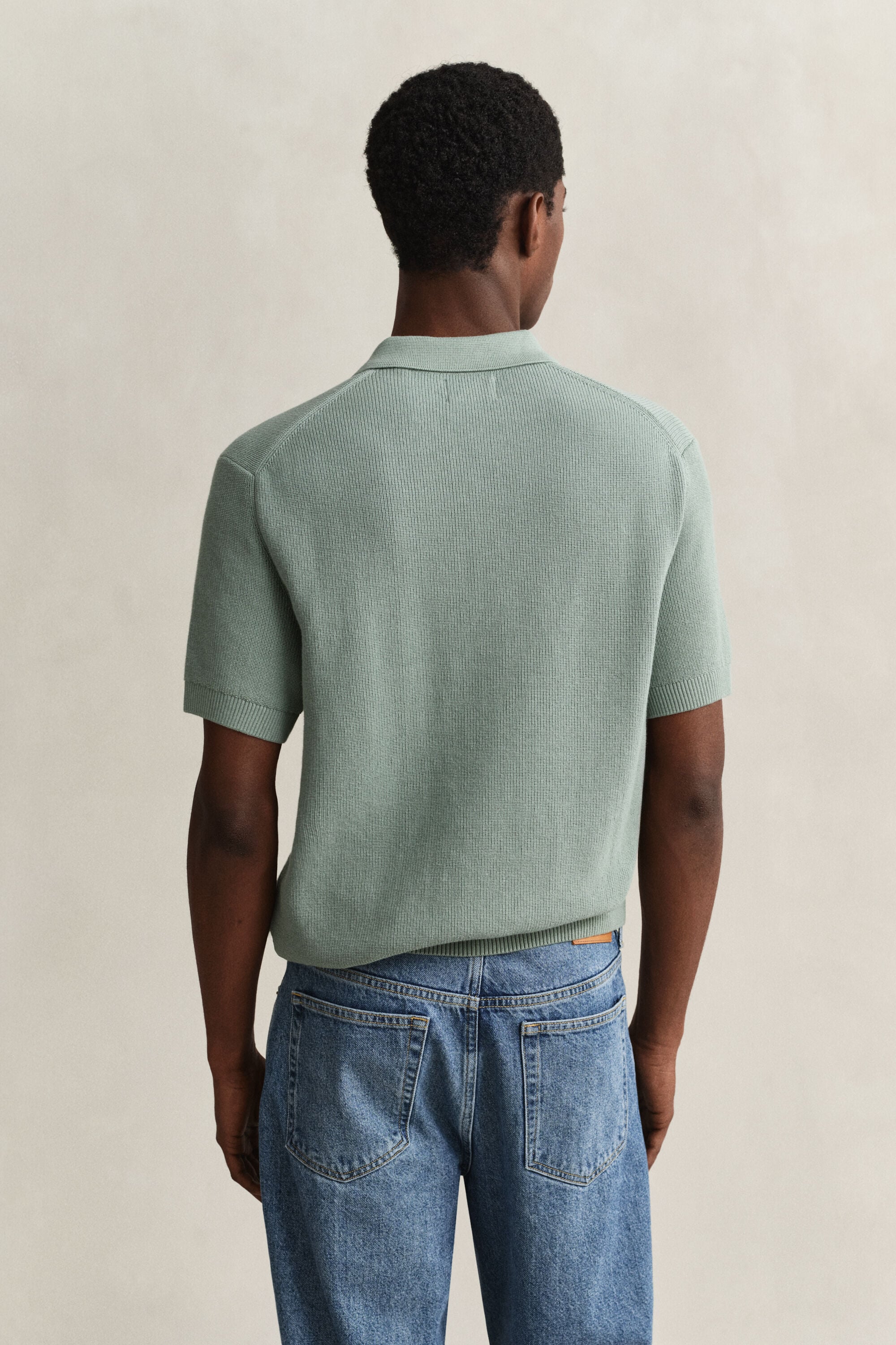 Camisola de malha tipo polo em algodão canelado