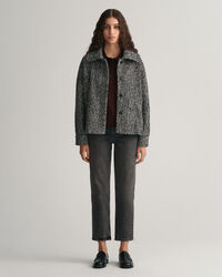 Calças de ganga pelo tornozelo com perna a direito