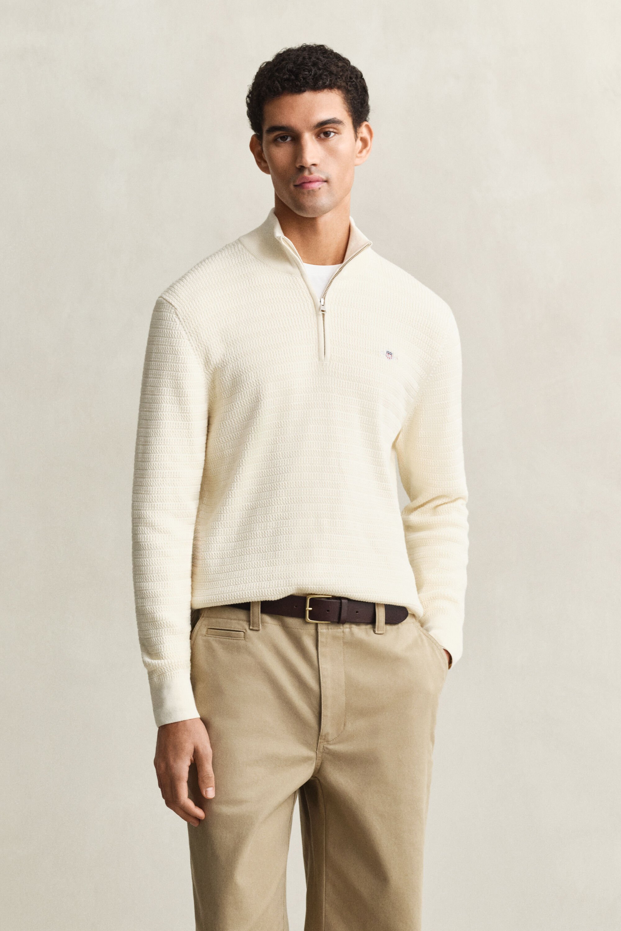 Camisola em mini malha entrançada com meio fecho de correr