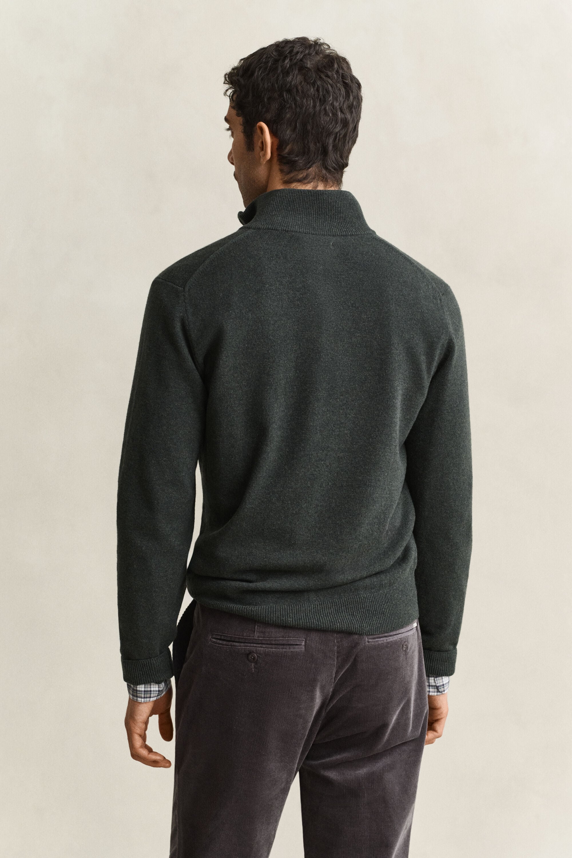 Camisola de malha com meio fecho de correr em lã