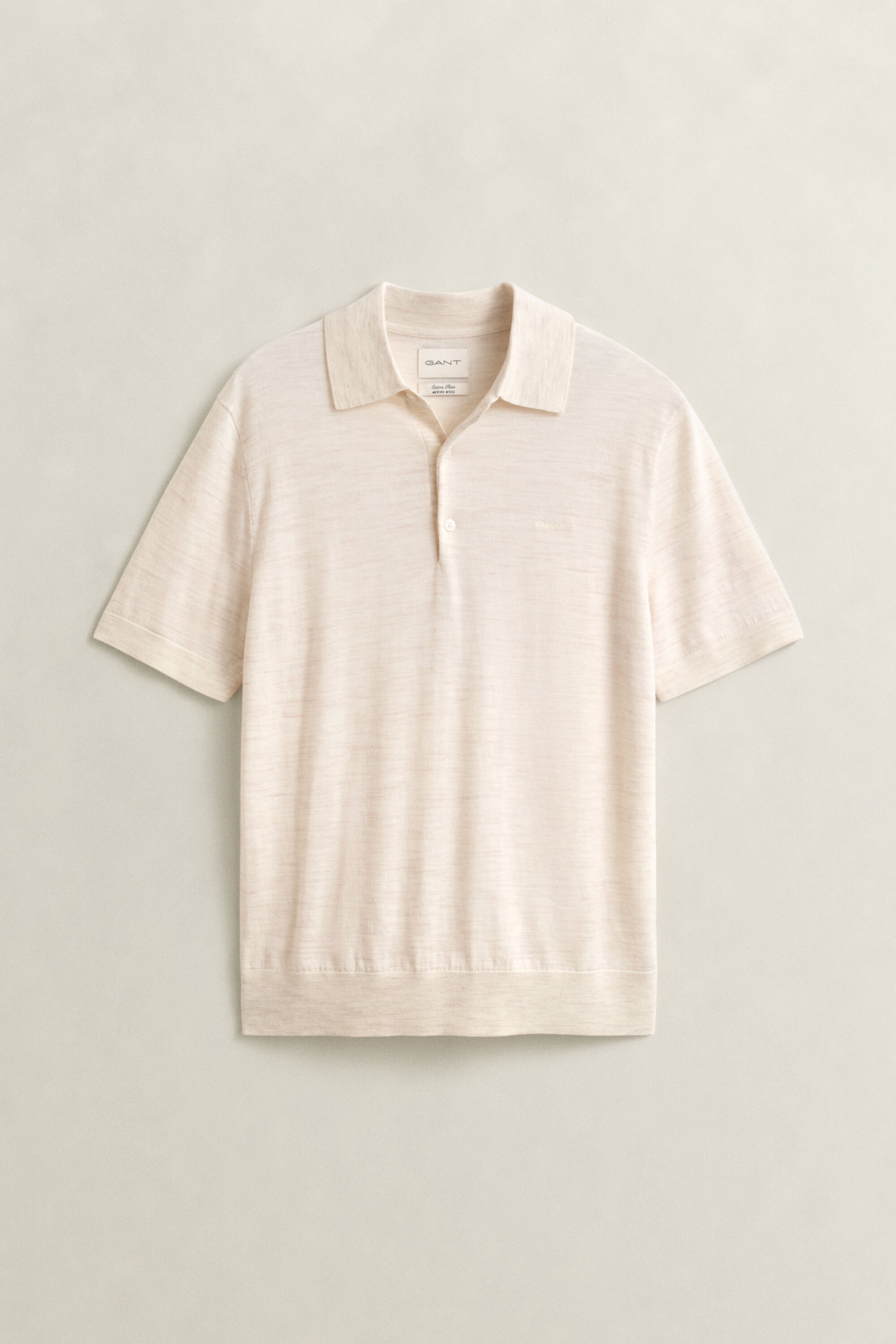 Camisola de malha estilo polo de manga curta em lã de merino extrafina