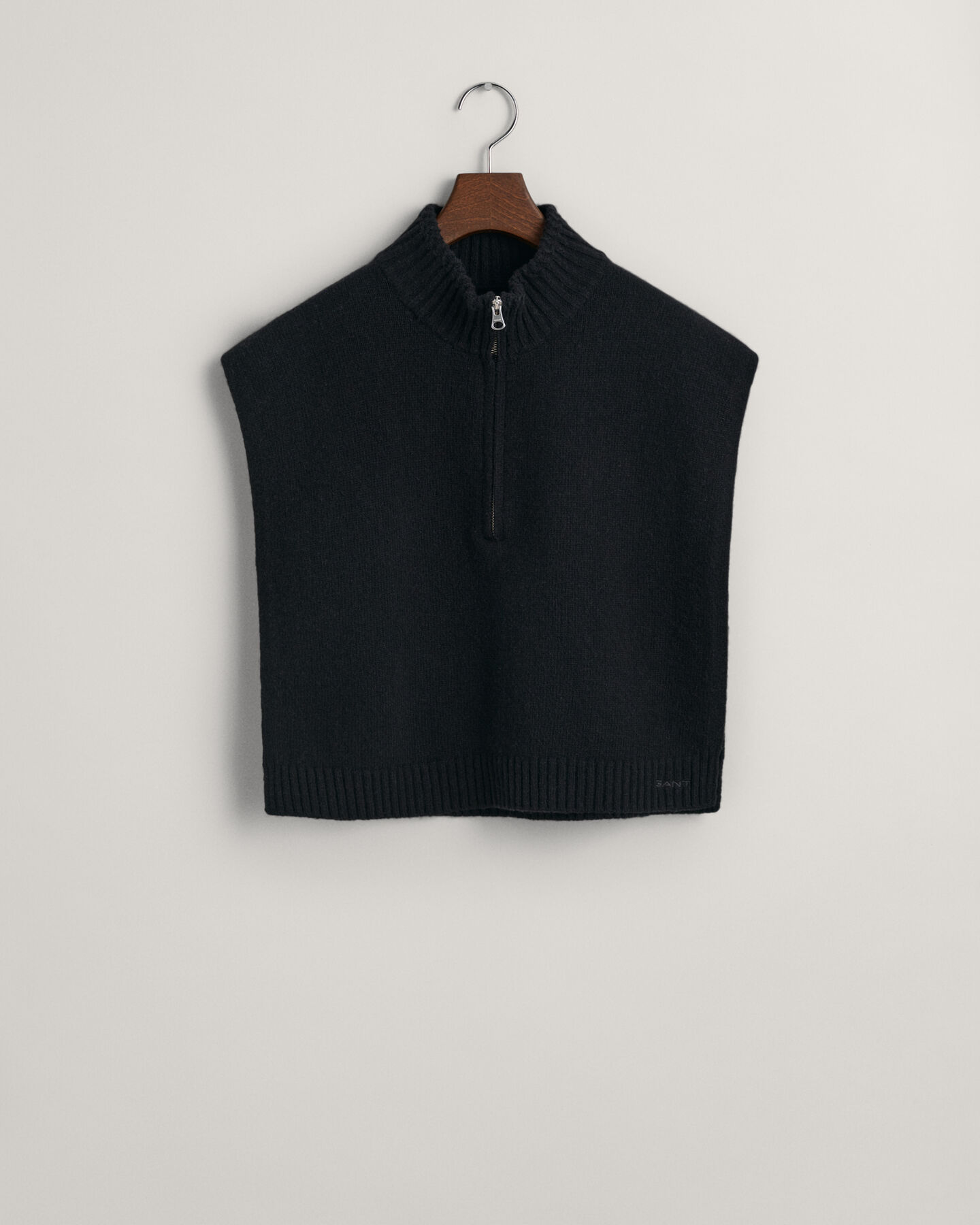 Peitilho em malha de lã com fecho de correr