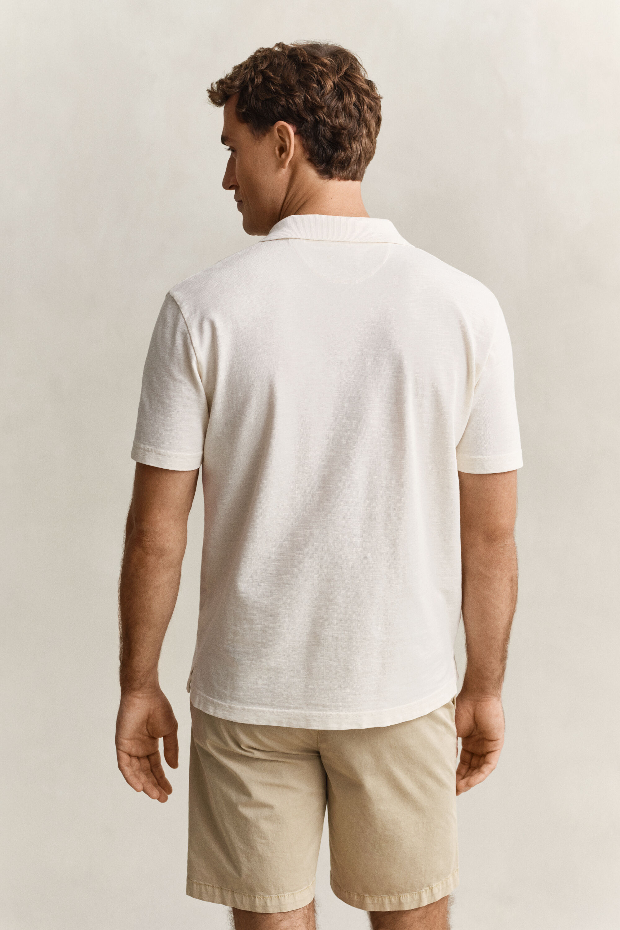 Polo com efeito desgastado