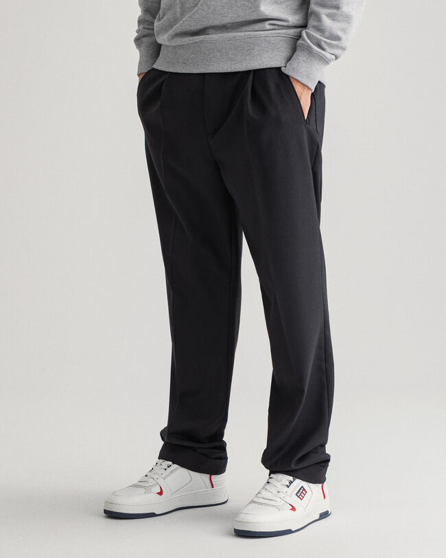 Cal&ccedil;as com pregas Fluid