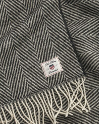 Manta decorativa em lã com padrão espinha de peixe