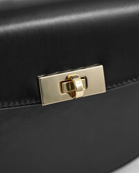 Mala de ombro em pele