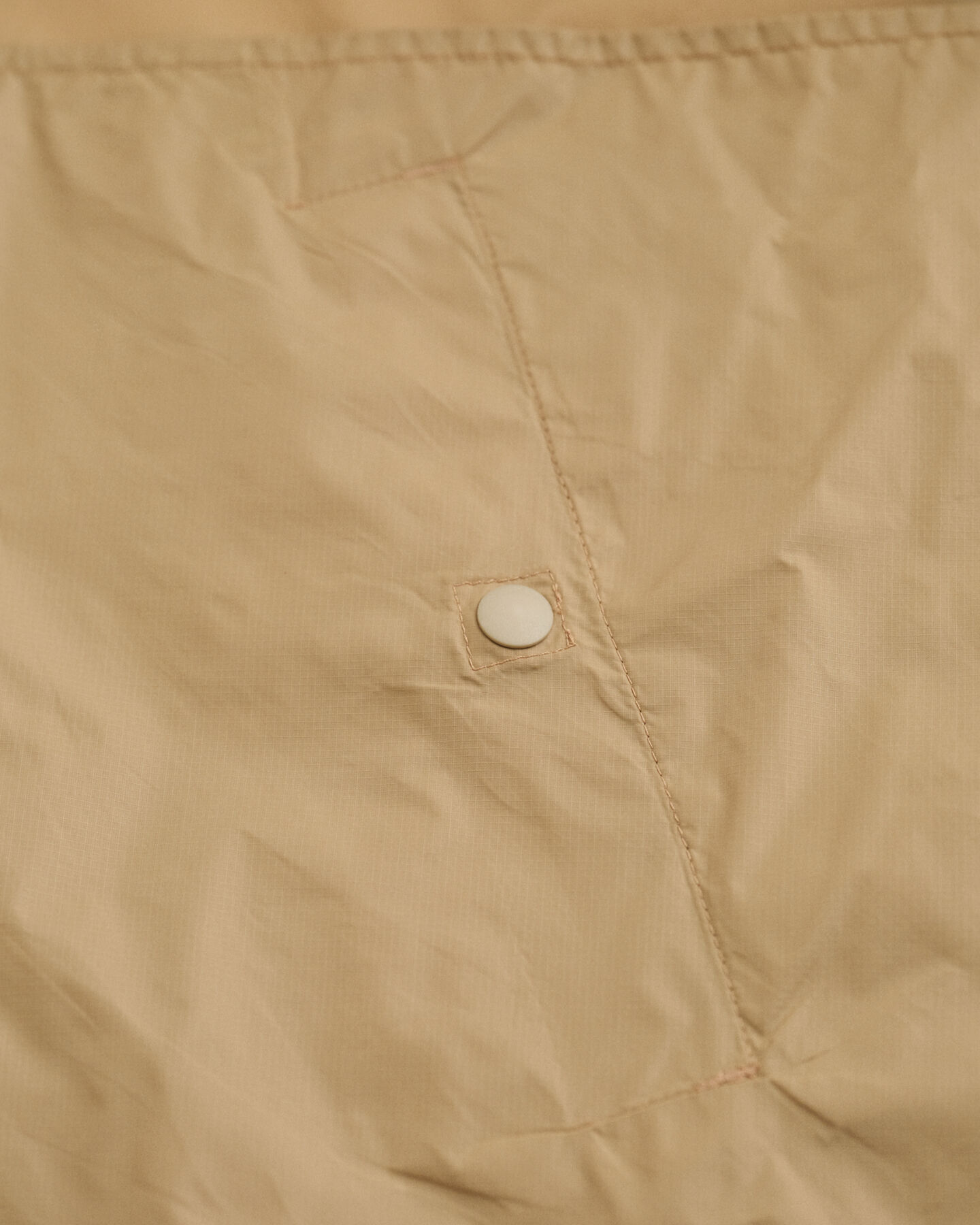 Casaco Windbreaker compactável leve