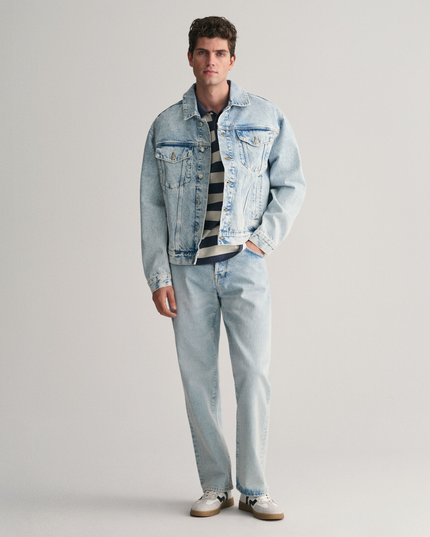 Polo &agrave;s riscas com lavagem intensa