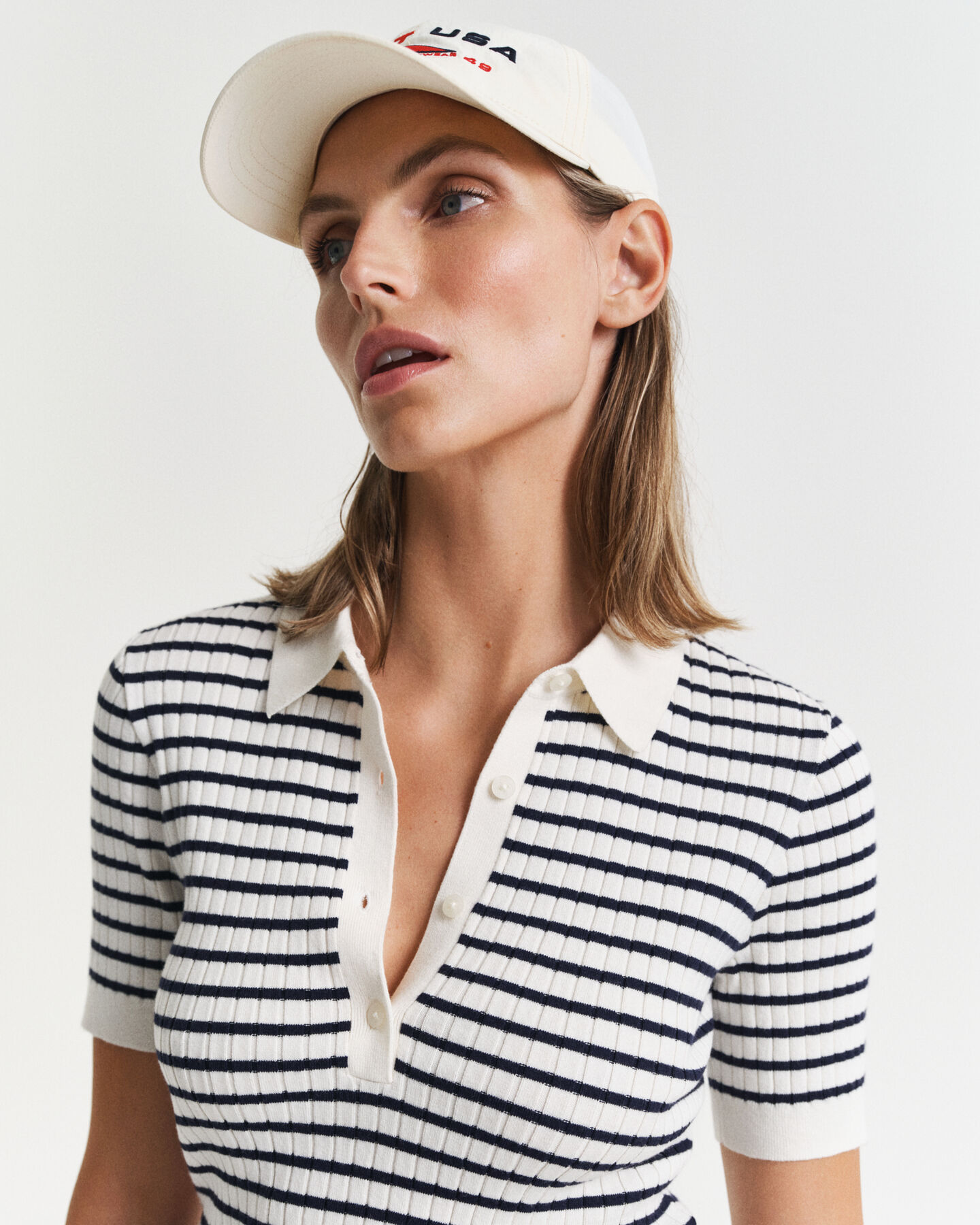 Rugger de manga curta em malha canelada às riscas