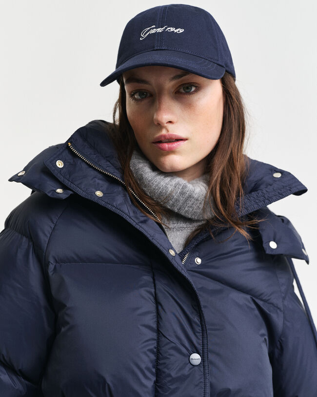 Blusão de penas com comprimento médio