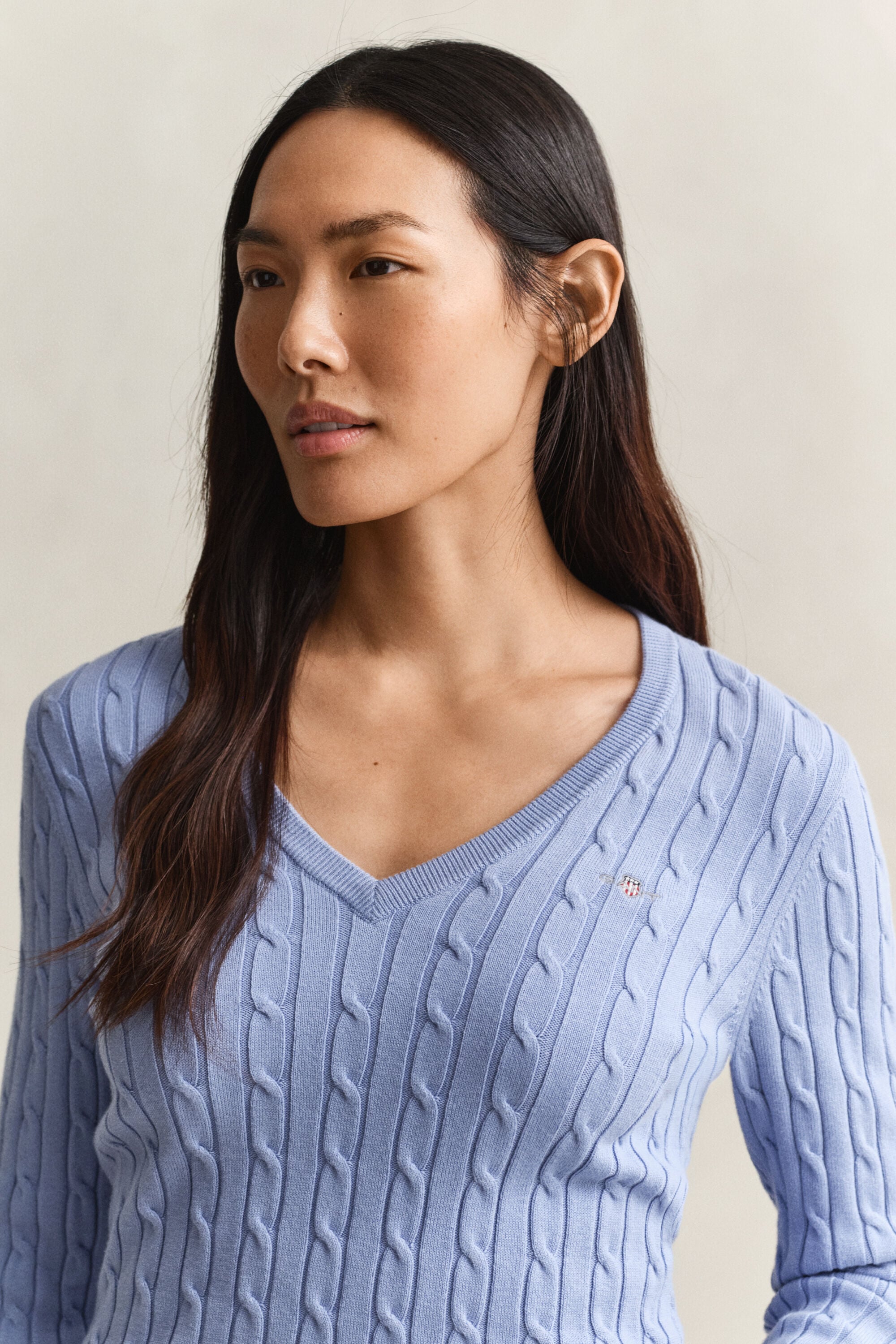 Camisola de malha entrançada com decote em V em algodão com elastano
