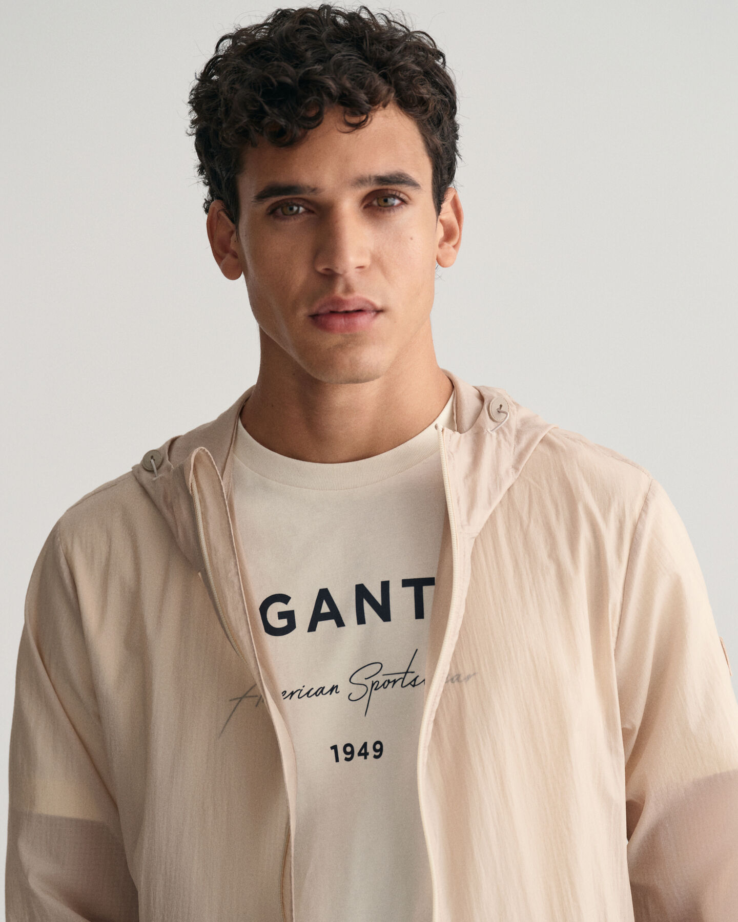 Casaco Windbreaker leve compactável