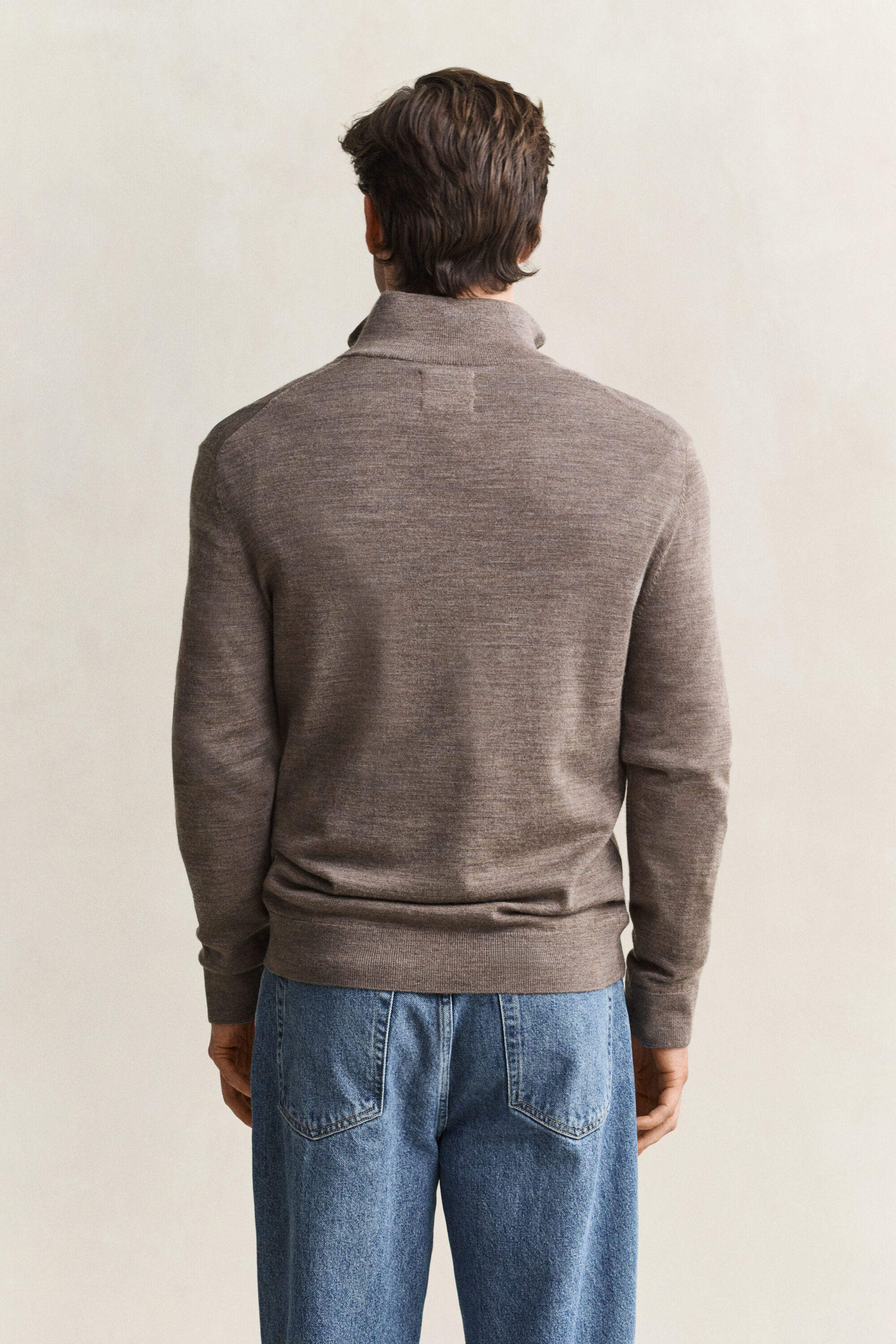 Camisola de malha com meio fecho de correr em lã de merino