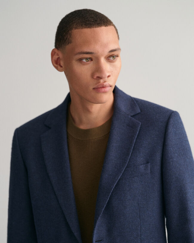 Blazer de fato com padr&atilde;o espinha de peixe