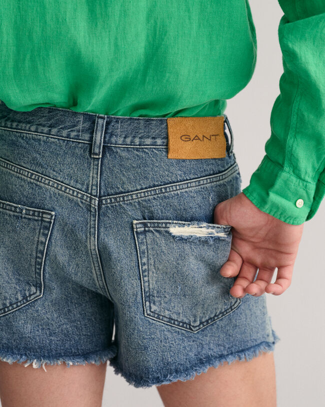 Cal&ccedil;&otilde;es de ganga com bainha desfiada