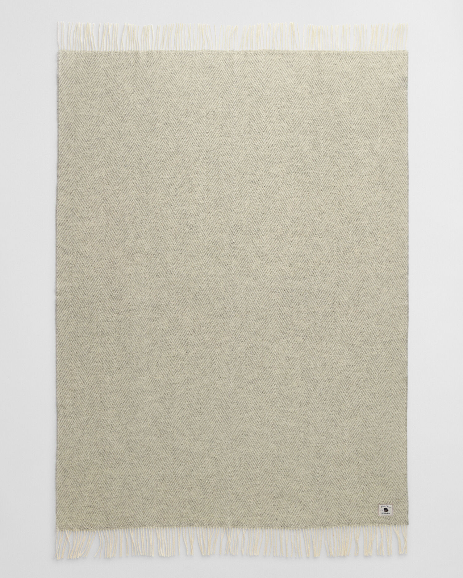 Manta decorativa em lã com padrão espinha de peixe