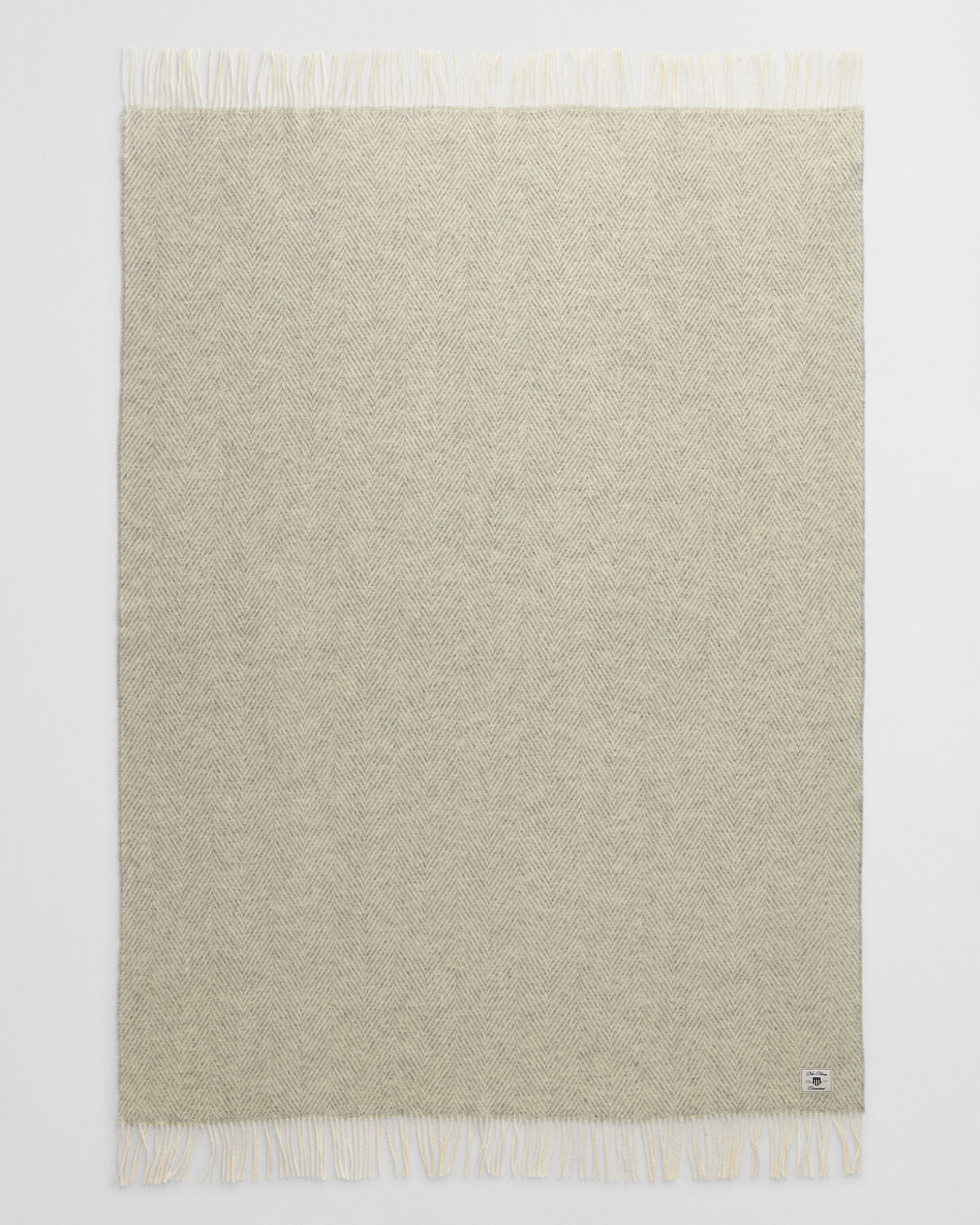 Manta decorativa em lã com padrão espinha de peixe