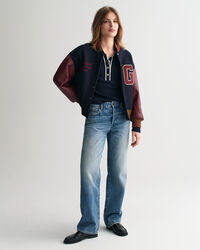 Polo de mangas compridas em malha canelada