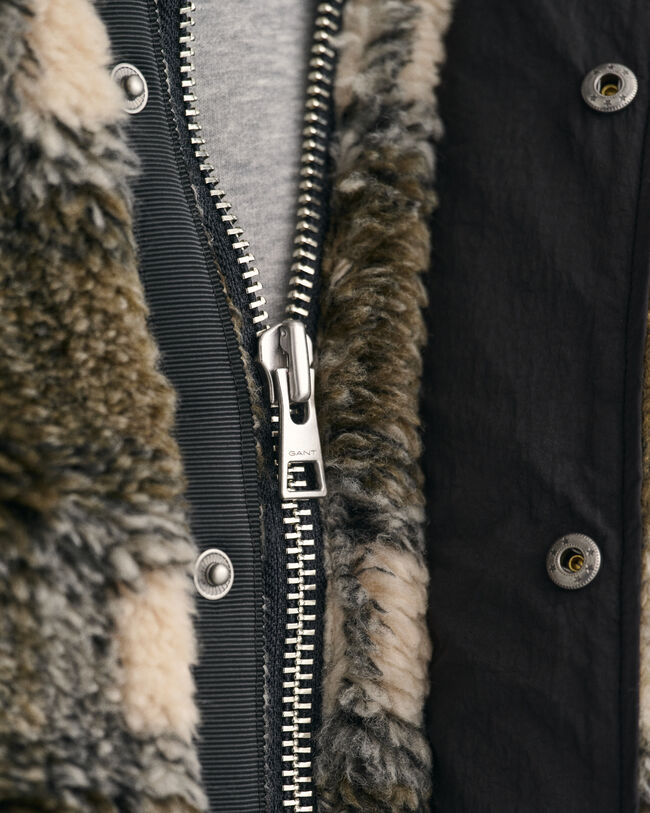 Polar com fecho de correr axadrezado