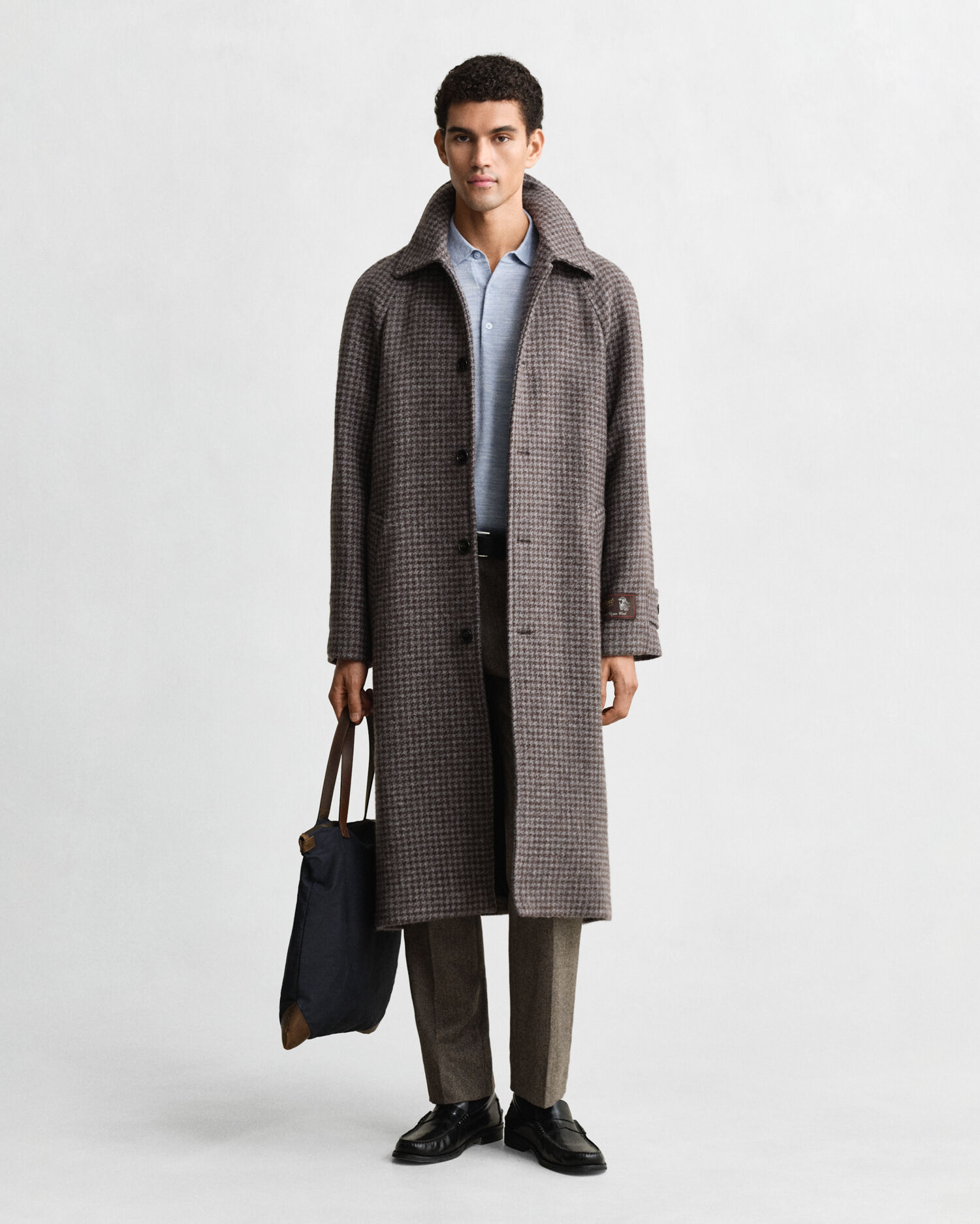 Camisola de malha estilo polo de manga curta em lã de merino extrafina