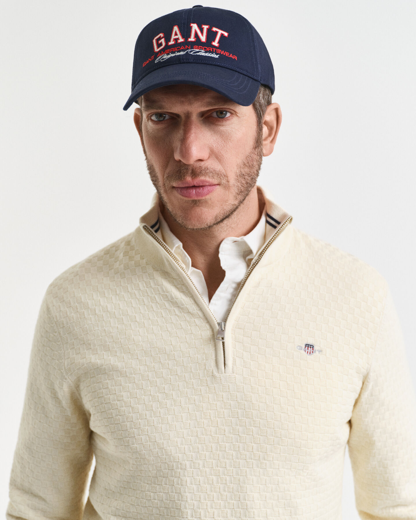 Camisola de malha com meio fecho de correr microtexturizada