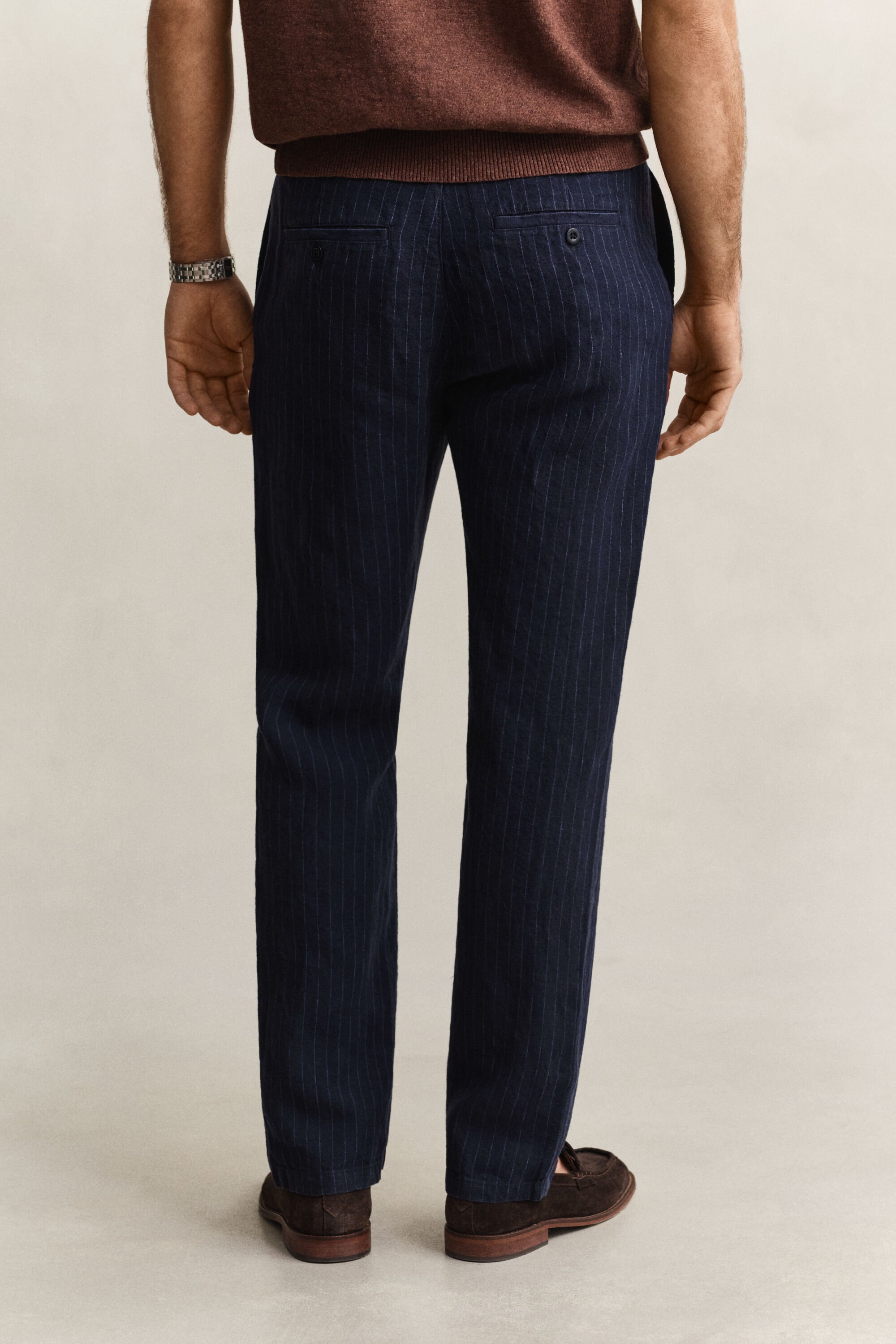 Calças em linho às riscas