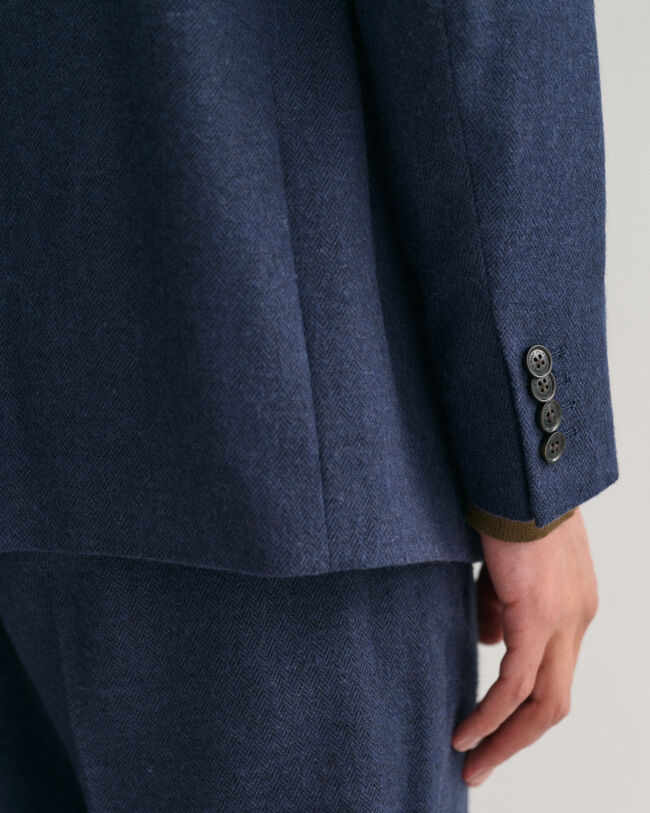 Blazer de fato com padr&atilde;o espinha de peixe