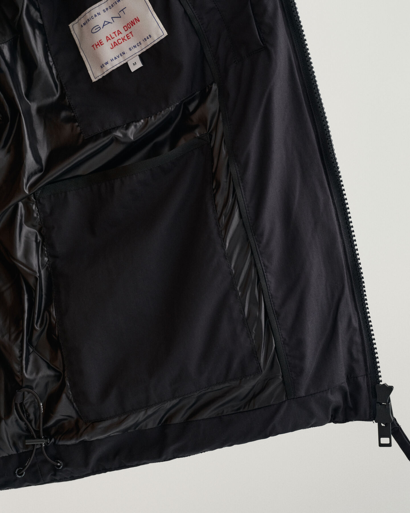 Blus&atilde;o de penas Alta