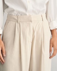 Calças sob medida em linho com elastano relaxed fit