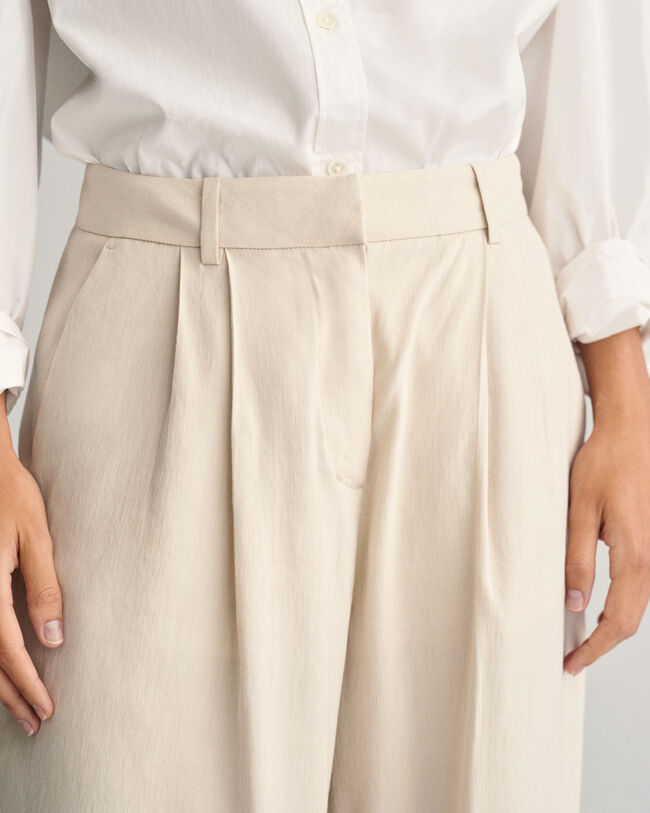 Calças sob medida em linho com elastano relaxed fit