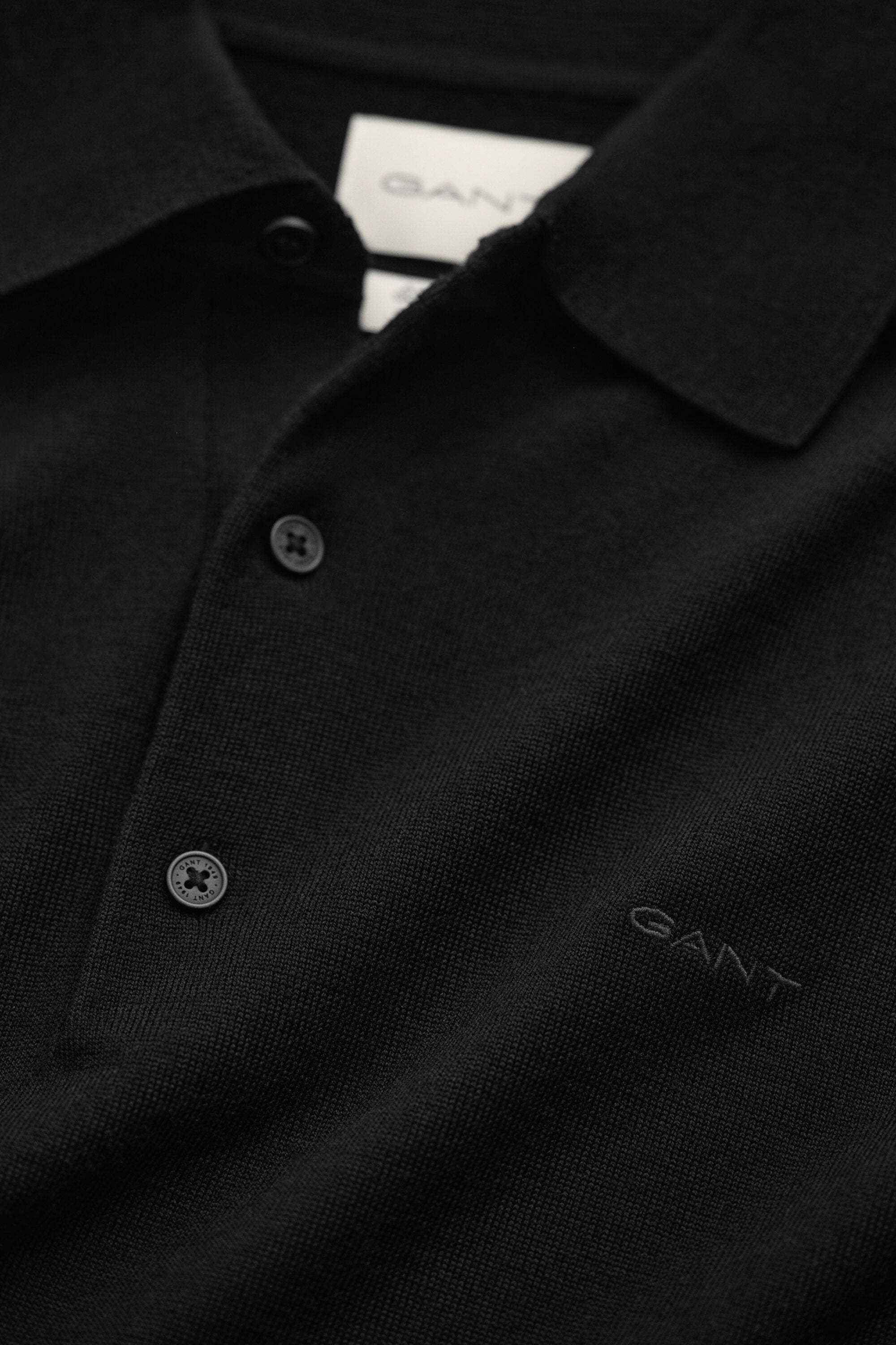 Camisola de malha estilo polo em lã de merino extrafina