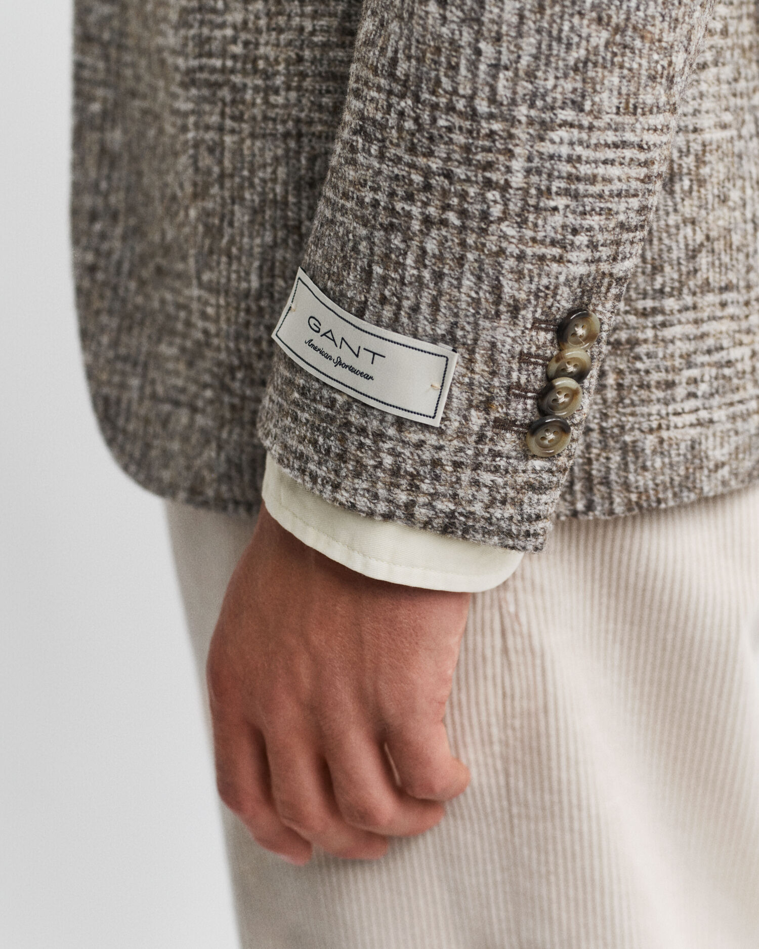 Blazer de malha com padrão de xadrez