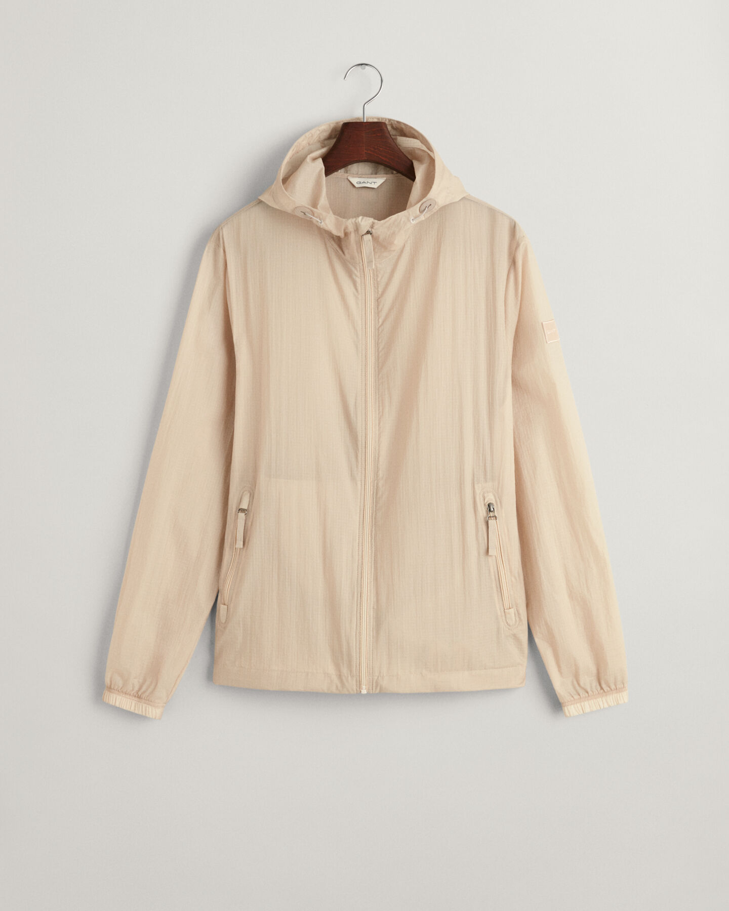 Casaco Windbreaker leve compactável