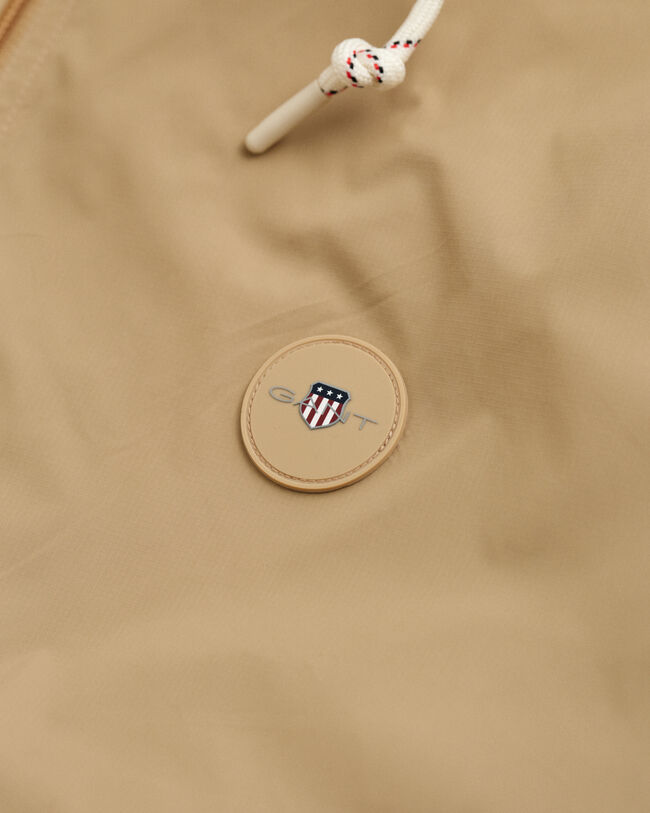 Casaco Windbreaker compactável leve