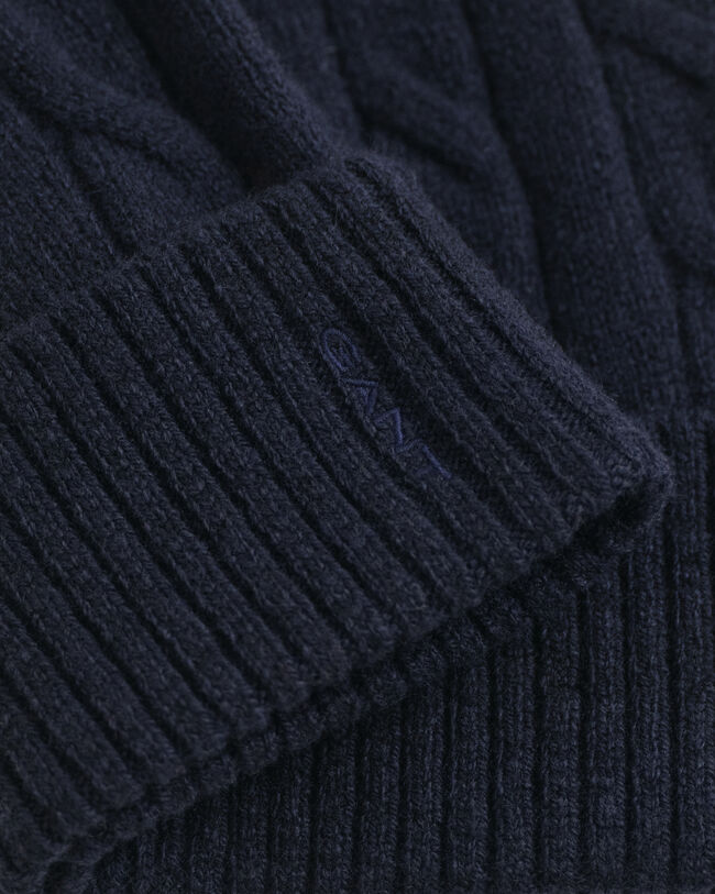 Gorro em malha entrançada de lã