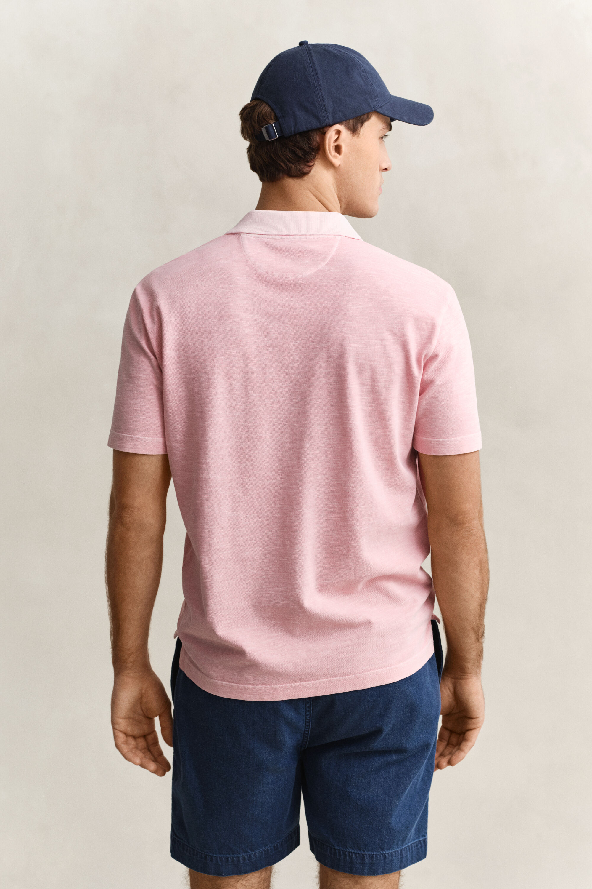 Polo com efeito desgastado