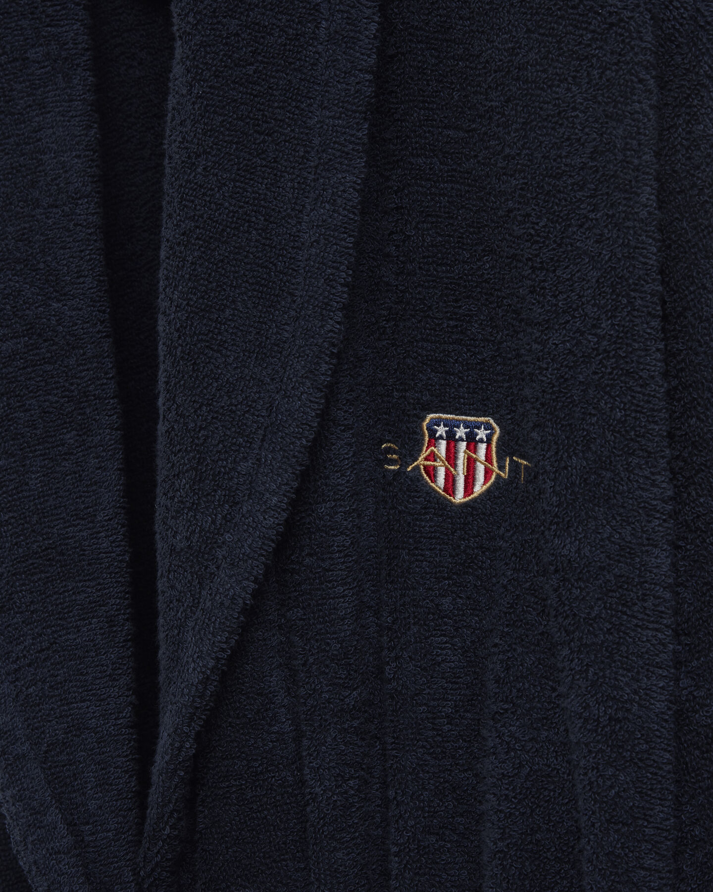 Roupão em tecido turco Archive Shield