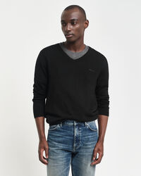 Pullover com decote em V em lã de merino extrafina