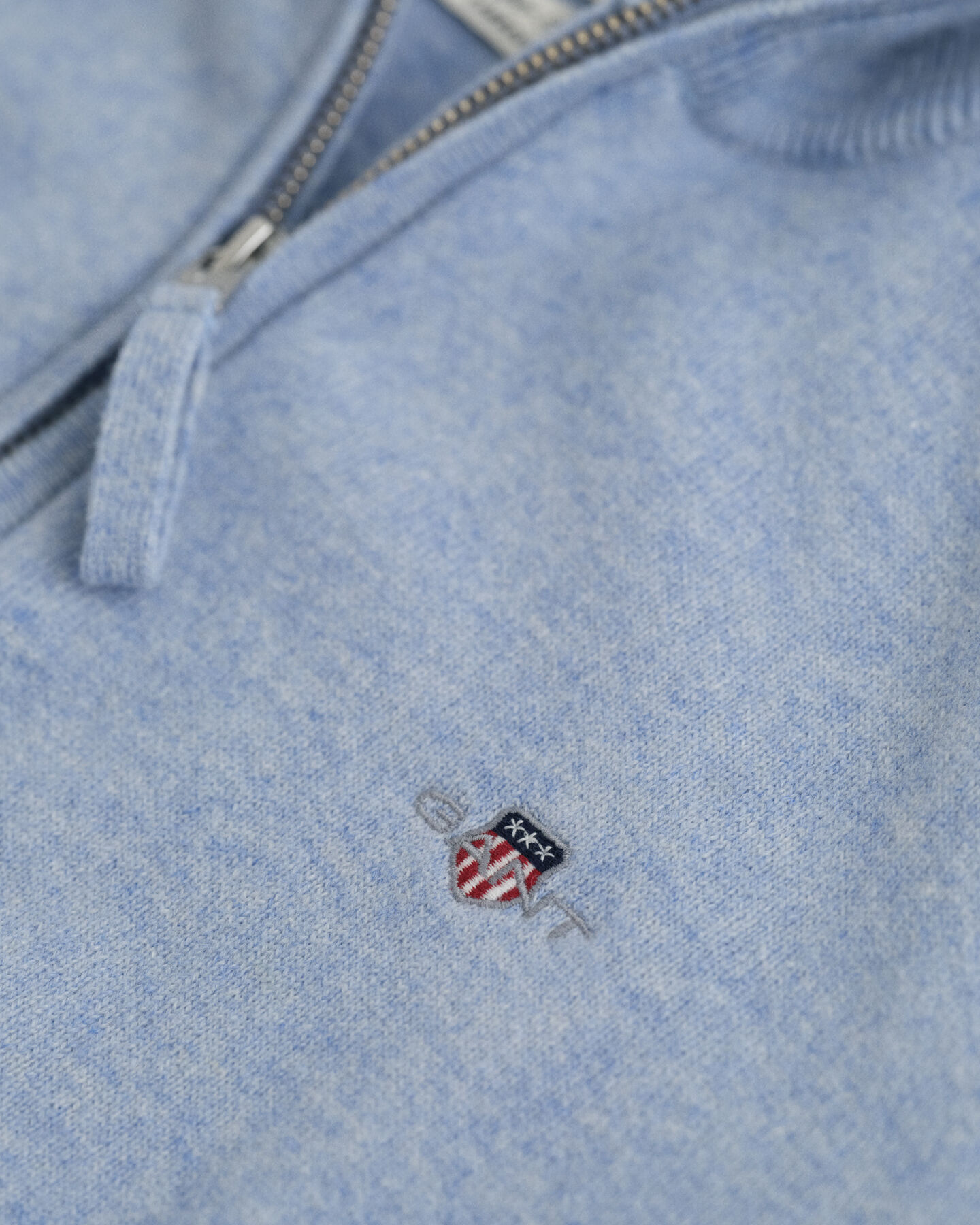 Camisola de malha com meio fecho em lã extrafina