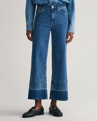 Cal&ccedil;as de ganga pelo tornozelo com perna larga