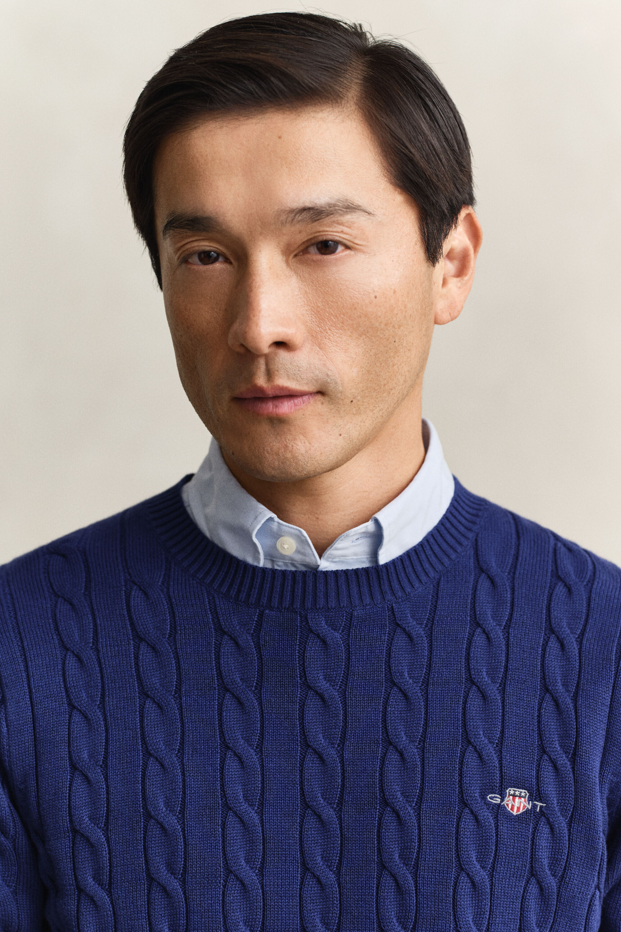 Camisola em malha entrançada de algodão com decote redondo