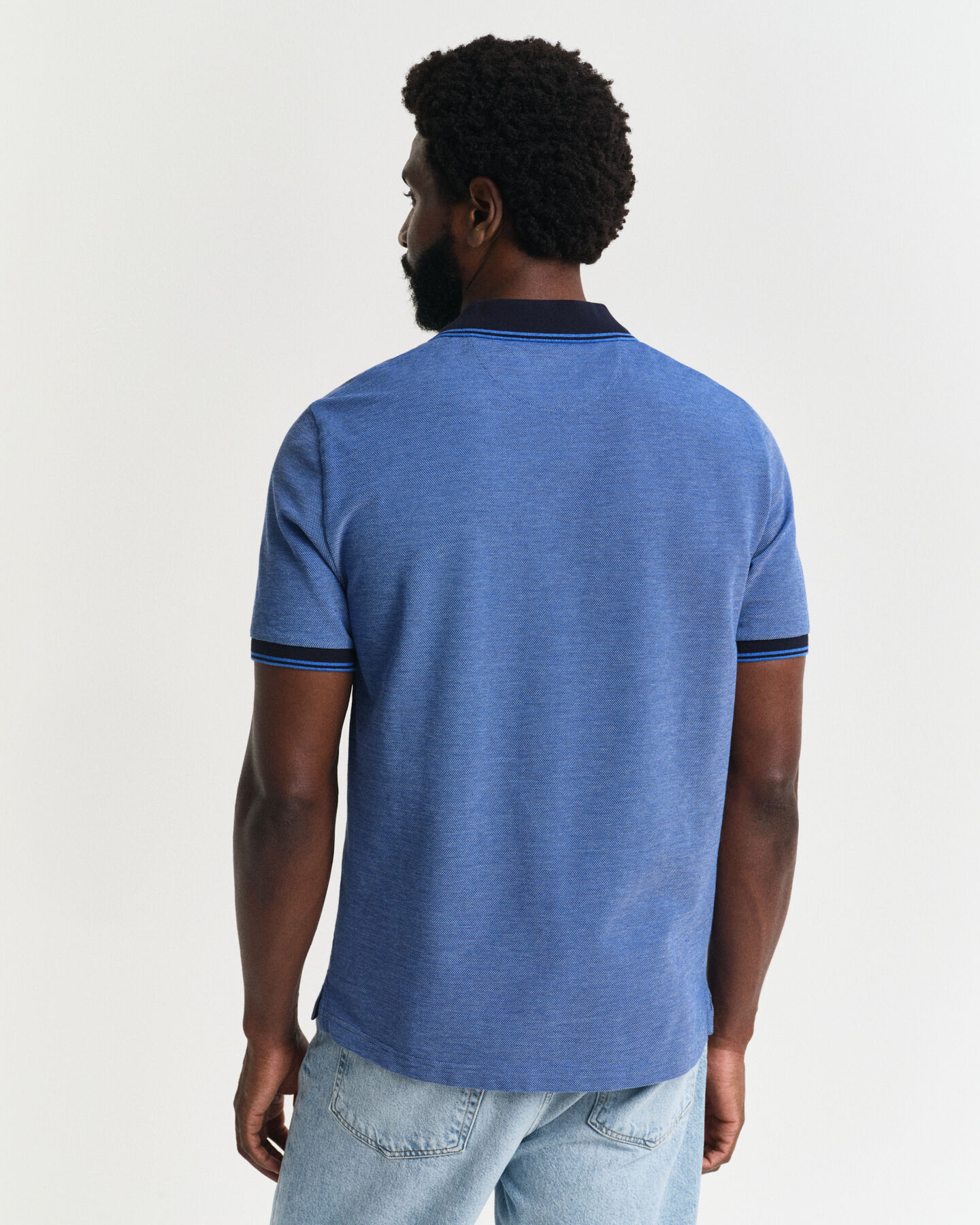 Polo em piqué Oxford em 4 cores