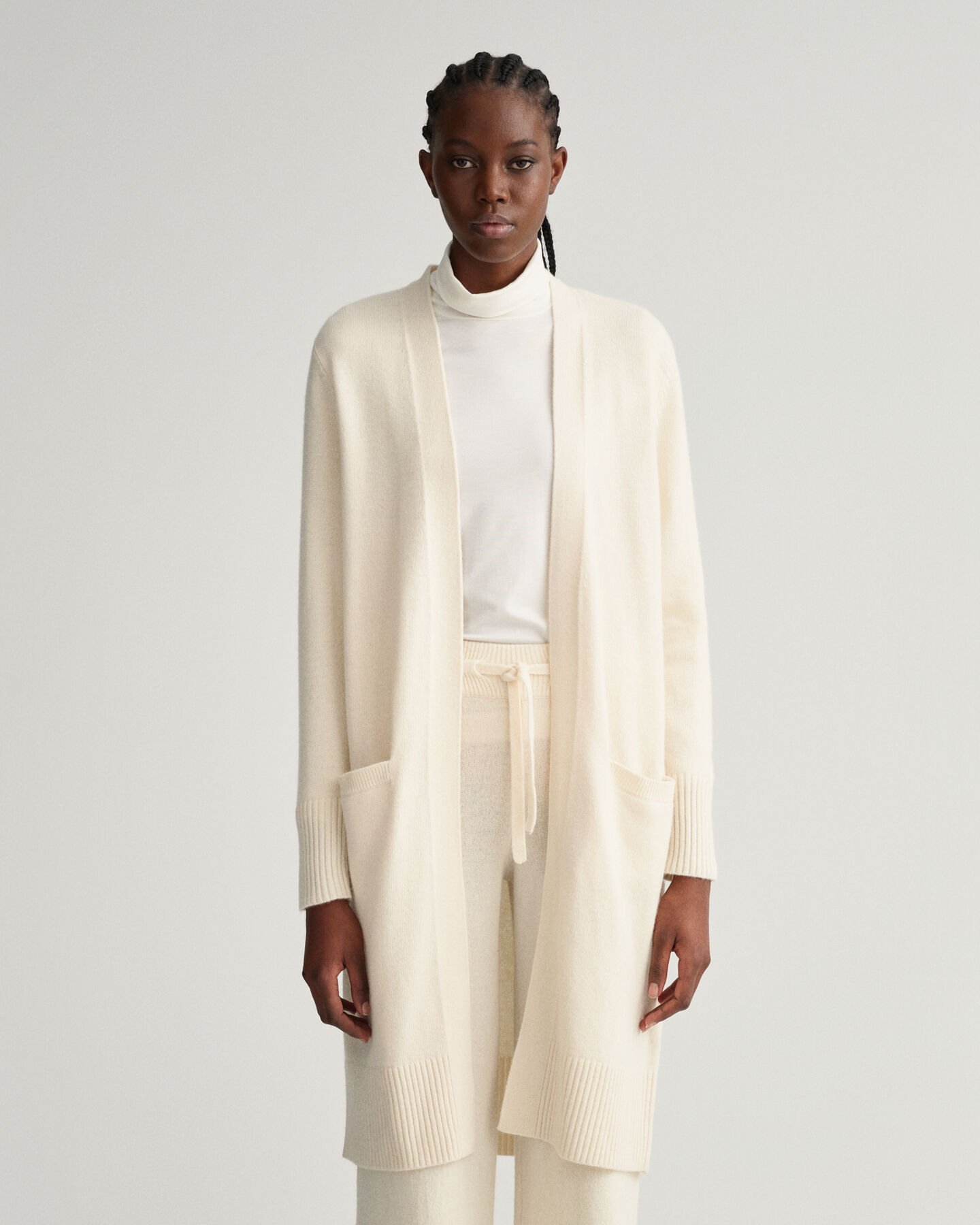 Casaco de malha comprido em l&atilde;