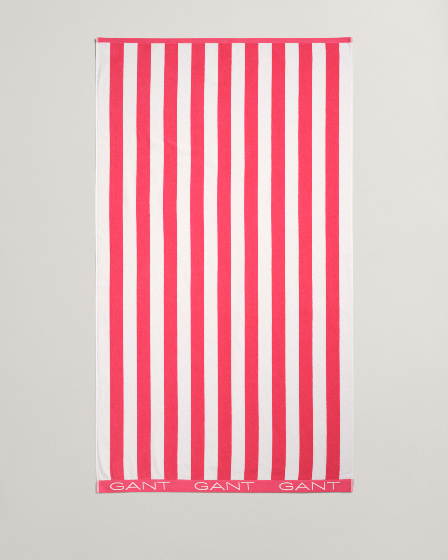 Toalha de praia às riscas em bloco