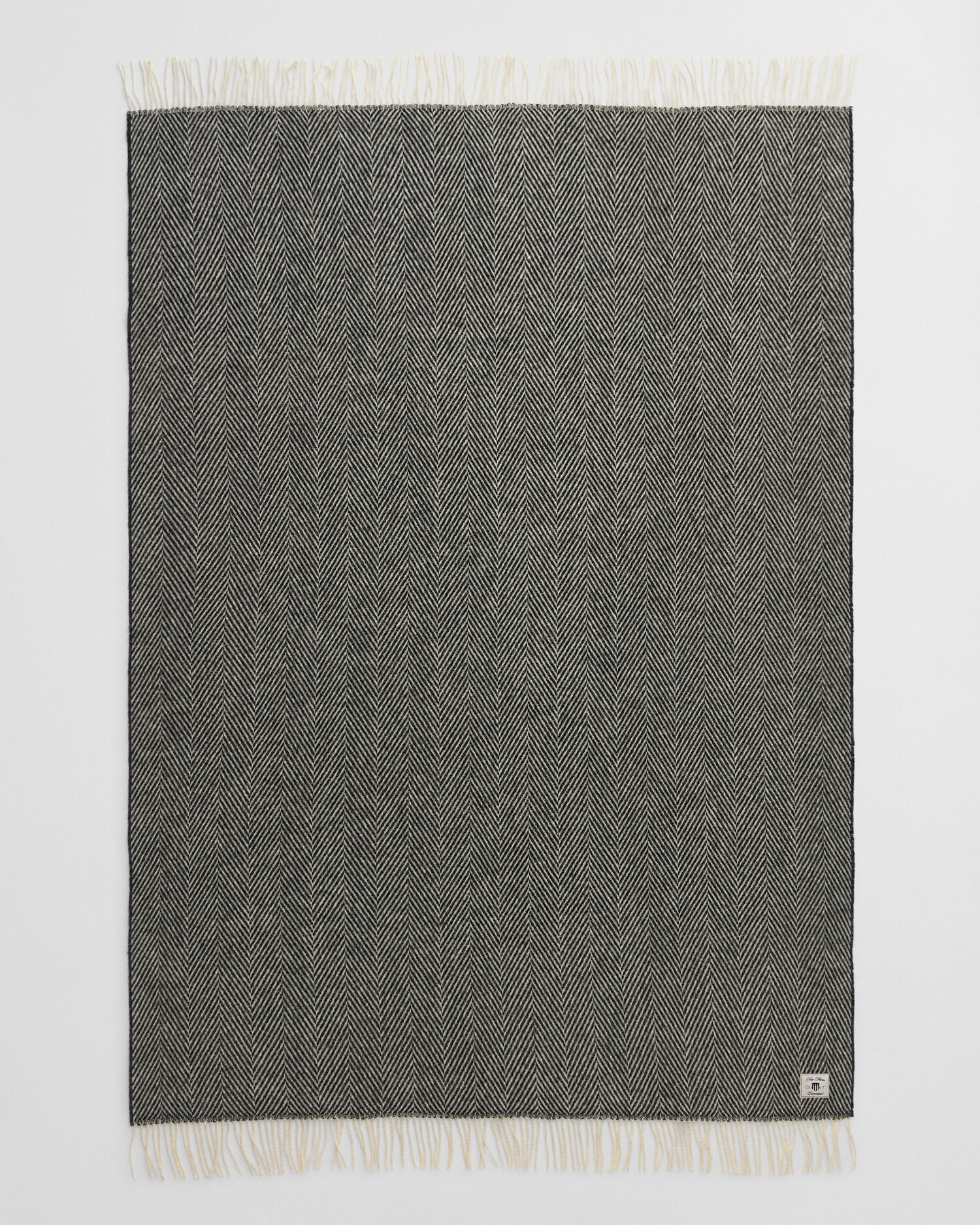 Manta decorativa em lã com padrão espinha de peixe